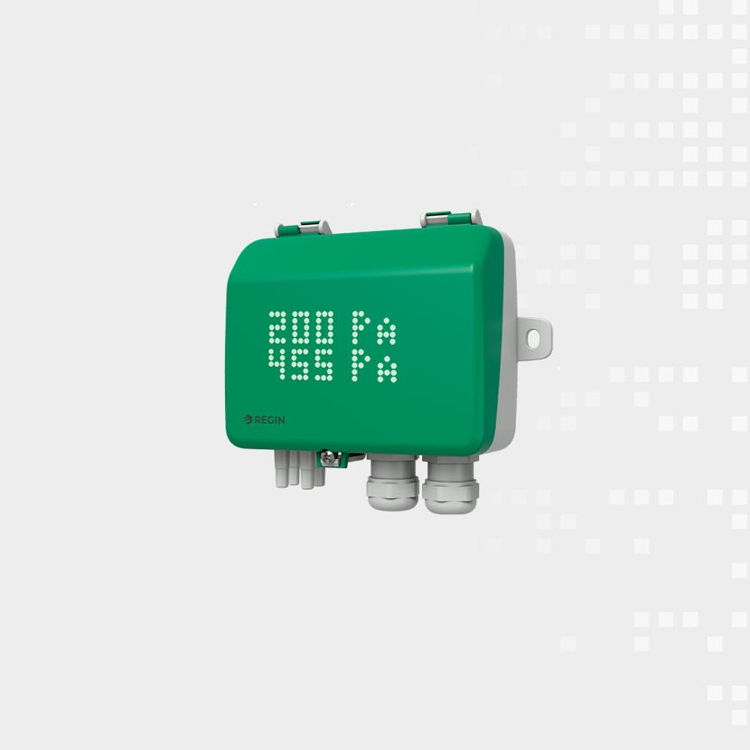 Green REGIN control box with dot-matrix display showing numbers, mounted on a light gray background.